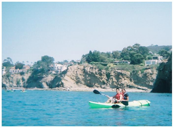 Rocio and I kayaking next to the La Jolla Cove caves.