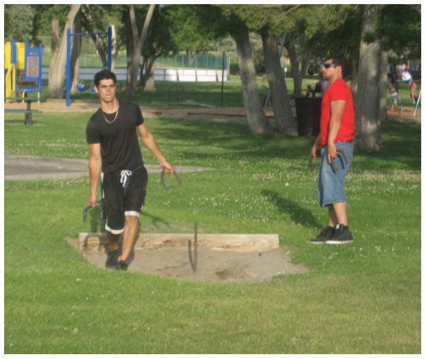 Throwing horseshoes at the park in Montrose, CO.